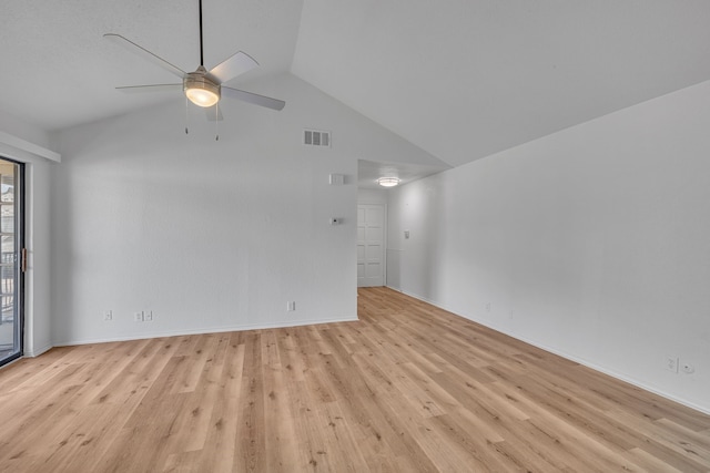 unfurnished living room featuring vaulted ceiling, ceiling fan, and light wood-type flooring