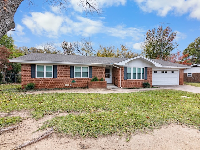 single story home with a garage and a front yard