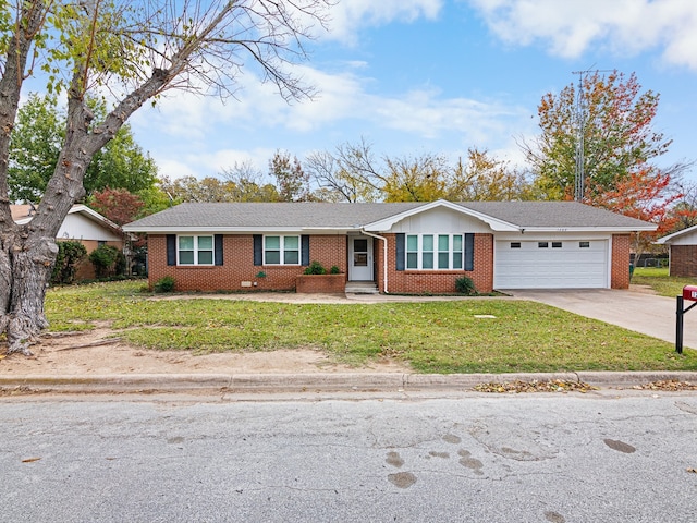 ranch-style house with a garage and a front yard