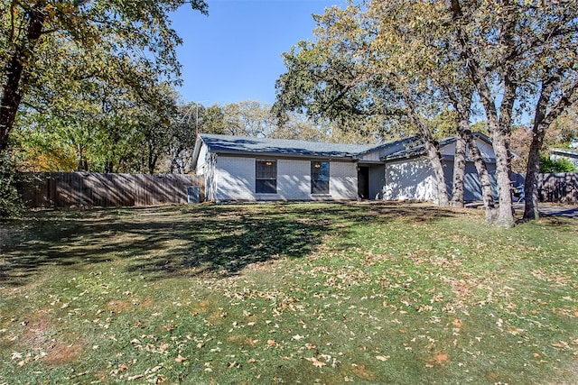 exterior space featuring a front lawn