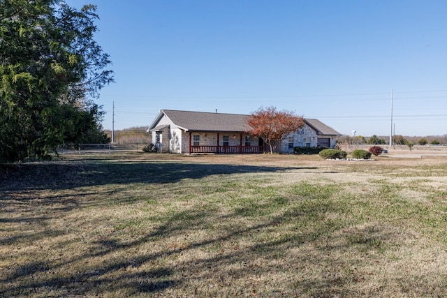 ranch-style house with a front yard