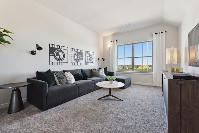 living room featuring light colored carpet and lofted ceiling