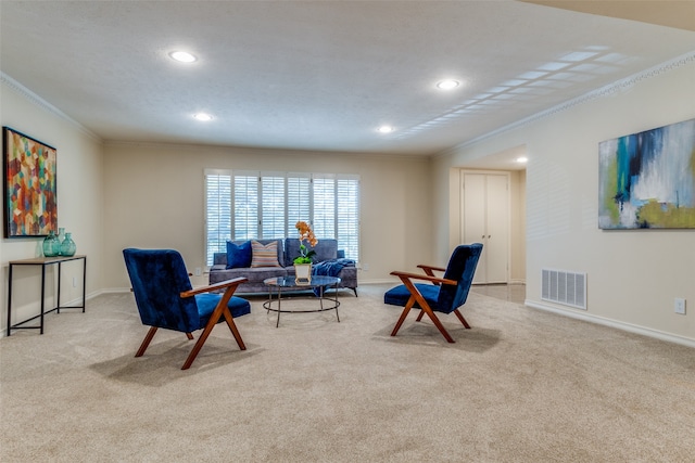 living area featuring light carpet and ornamental molding