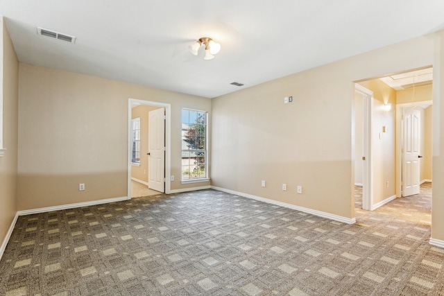 view of carpeted spare room