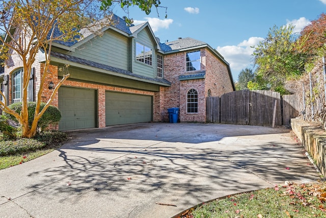 view of front of property featuring a garage