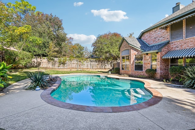 view of pool with a patio area