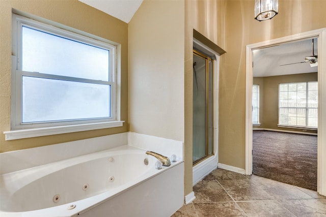 bathroom with plus walk in shower and ceiling fan