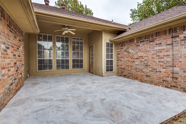 view of patio featuring ceiling fan