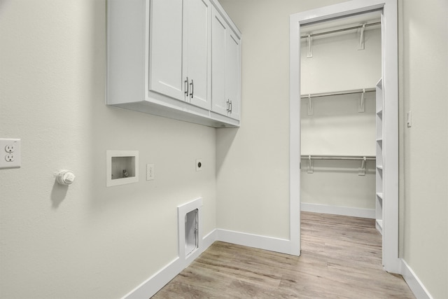 laundry area with cabinets, hookup for a washing machine, light wood-type flooring, gas dryer hookup, and electric dryer hookup