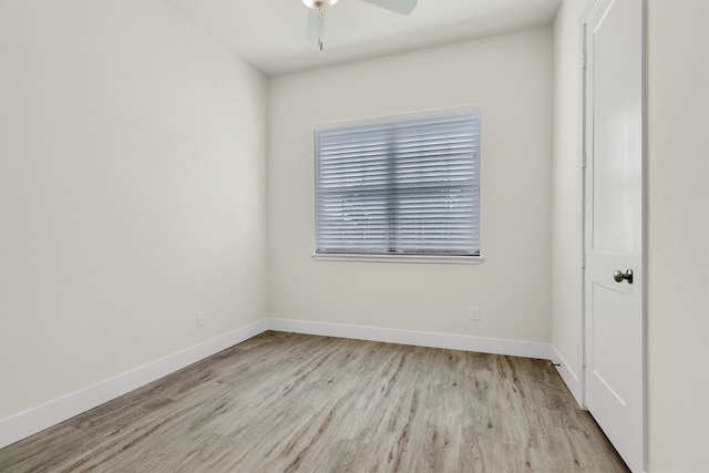 unfurnished room featuring ceiling fan and light wood-type flooring