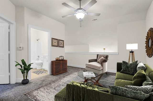 living room with carpet floors and ceiling fan