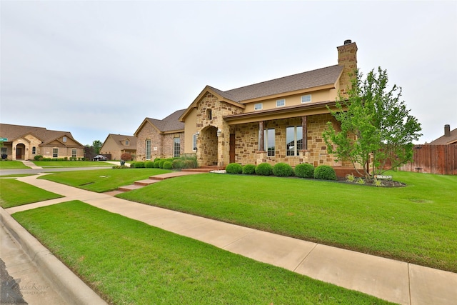 view of front of property featuring a front yard