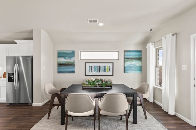 1914 Starling St, Princeton, TX 75407 - dining room with dark wood-type flooring and lofted ceiling