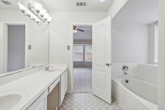 bathroom featuring vanity and a bathtub