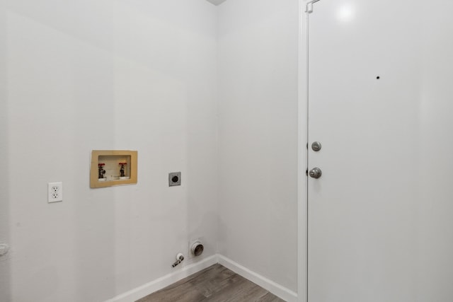 laundry room with wood-type flooring, hookup for a washing machine, and electric dryer hookup