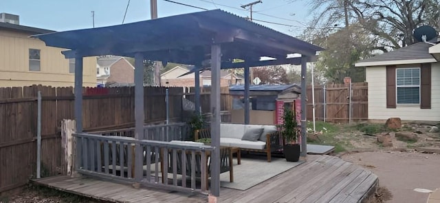 wooden deck featuring an outdoor living space