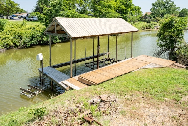 view of dock with a water view