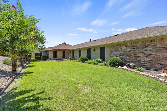 exterior space with a lawn