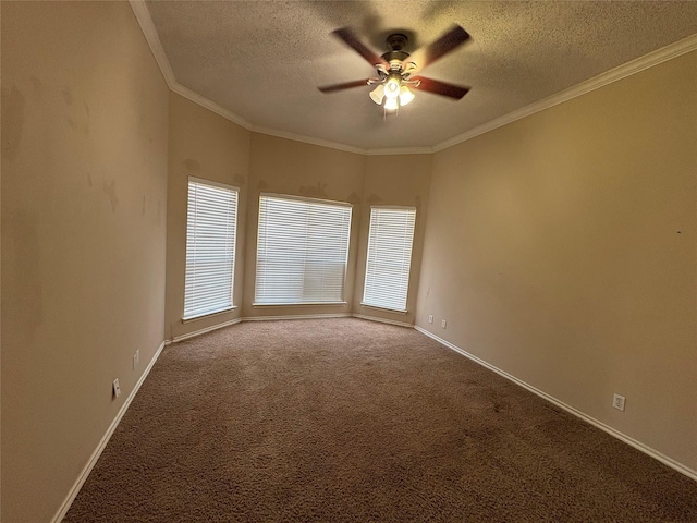 carpeted spare room featuring crown molding, a textured ceiling, and ceiling fan