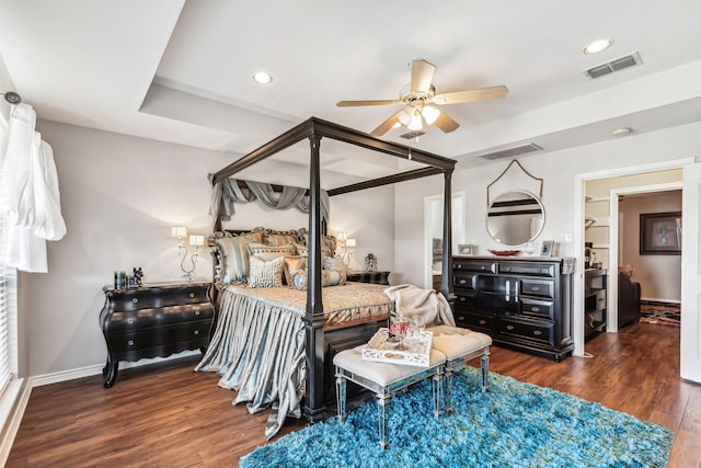 bedroom featuring dark hardwood / wood-style floors and ceiling fan