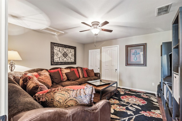 living room featuring ceiling fan