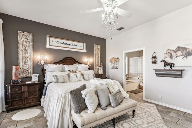 bedroom featuring ceiling fan and ensuite bath