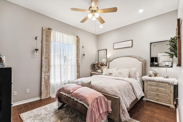 bedroom featuring dark hardwood / wood-style floors and ceiling fan