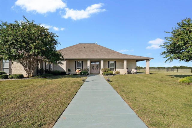 view of front of property with a front lawn