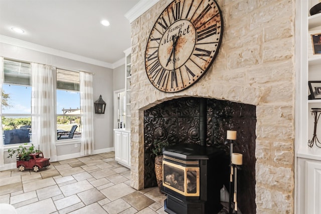 living room featuring crown molding and a wood stove