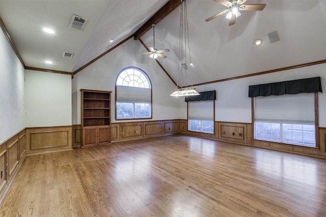 unfurnished living room with crown molding, high vaulted ceiling, light hardwood / wood-style flooring, beamed ceiling, and ceiling fan