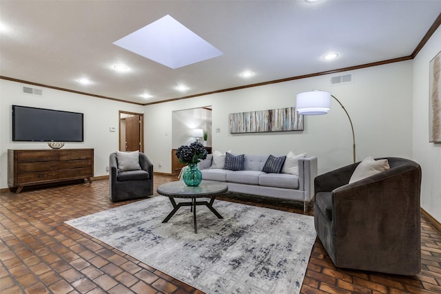 living room with a skylight and crown molding