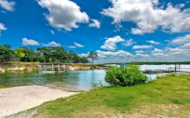 view of water feature with a dock