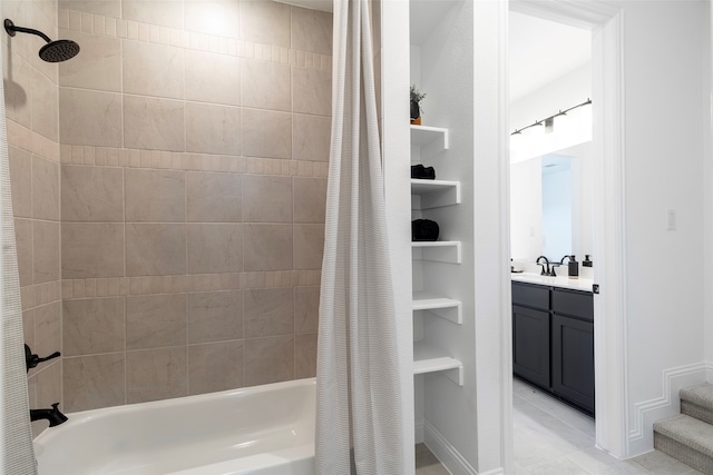 bathroom featuring tile patterned floors, shower / bath combination with curtain, and vanity