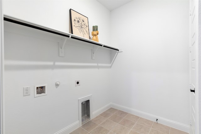 laundry room with hookup for an electric dryer, gas dryer hookup, light tile patterned floors, and hookup for a washing machine