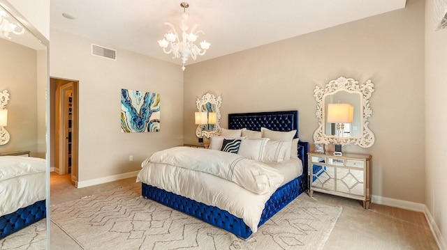 bedroom featuring a notable chandelier, carpet floors, and lofted ceiling