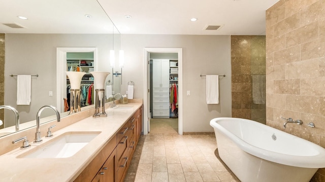 bathroom featuring a bathtub and vanity