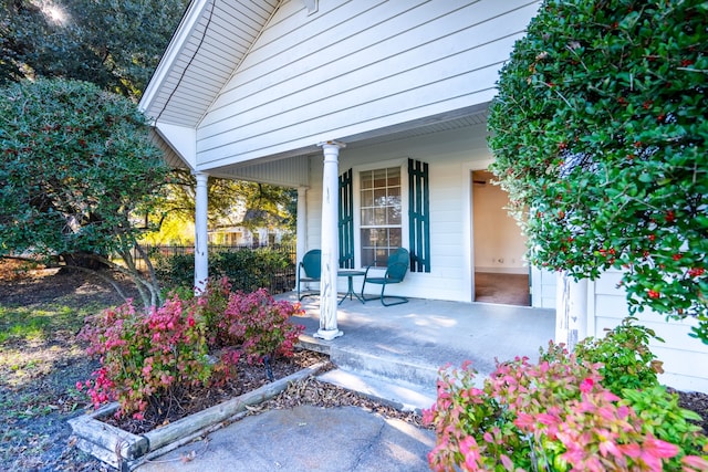 view of patio featuring a porch