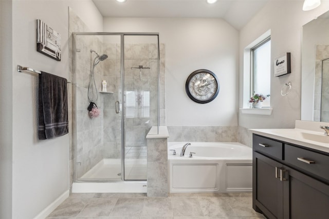 bathroom featuring tile patterned flooring, vanity, lofted ceiling, and shower with separate bathtub