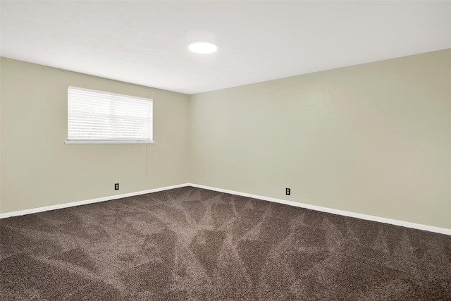 spare room featuring carpet floors