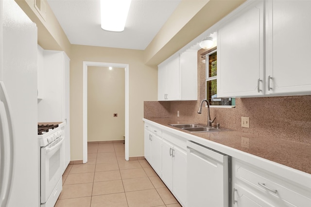 kitchen featuring white appliances, tasteful backsplash, white cabinetry, and sink