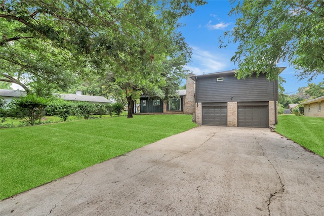 view of property exterior featuring a garage and a lawn