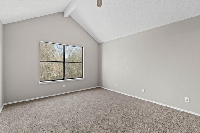 spare room featuring carpet flooring, a textured ceiling, lofted ceiling with beams, and ceiling fan