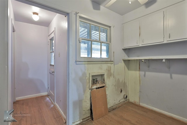 clothes washing area with hookup for a washing machine, light hardwood / wood-style flooring, cabinets, and ceiling fan