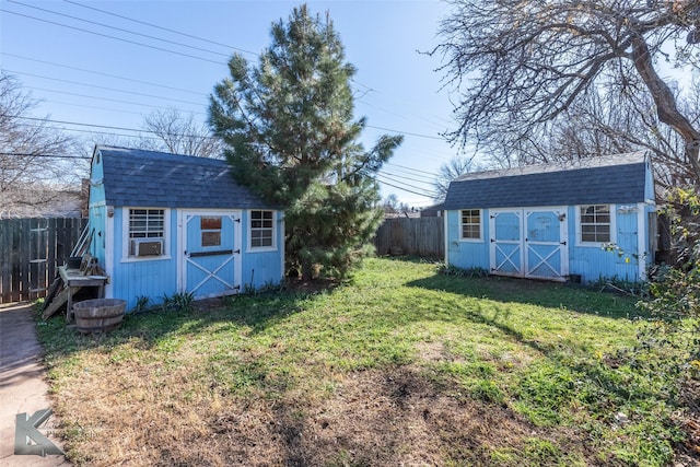 view of yard with a storage unit