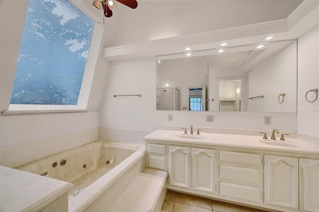 bathroom with independent shower and bath, vanity, tile patterned floors, and ceiling fan