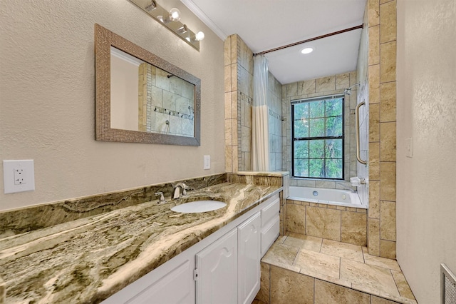 bathroom featuring vanity and shower / bath combo with shower curtain