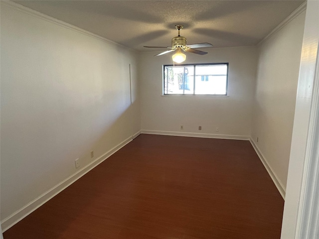 unfurnished room with a textured ceiling, dark hardwood / wood-style floors, and ceiling fan