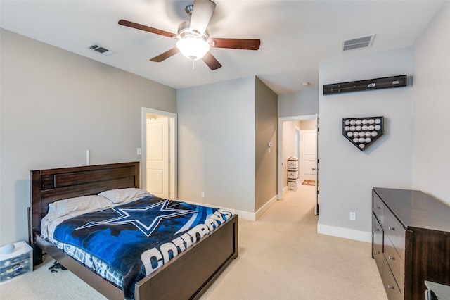 bedroom with light carpet and ceiling fan