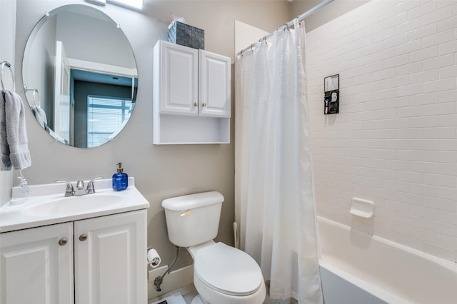 full bathroom featuring vanity, shower / bath combination with curtain, and toilet