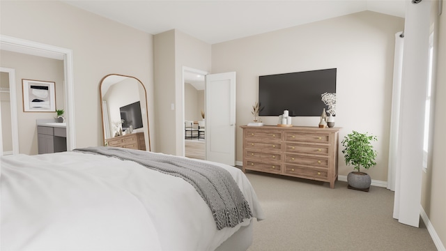 bedroom featuring light colored carpet and connected bathroom